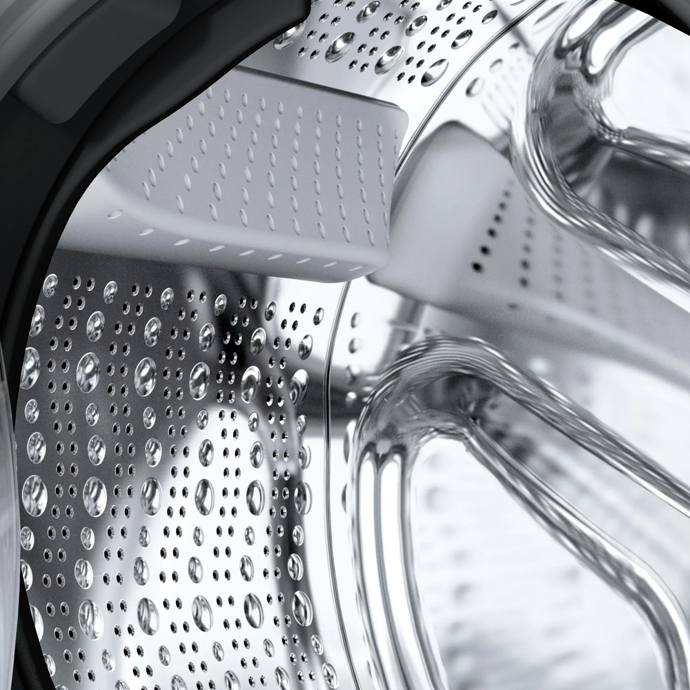 Close-up of the Bosch WaveDrum interior showing the droplet-shaped drum structure