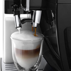 De'Longhi Dinamica Plus ECAM382.70.B LatteCrema Hot milk system pouring dense foam into a cappuccino