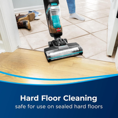 BISSELL CrossWave HF2 3845E cleaning hard floor safely near a doorway