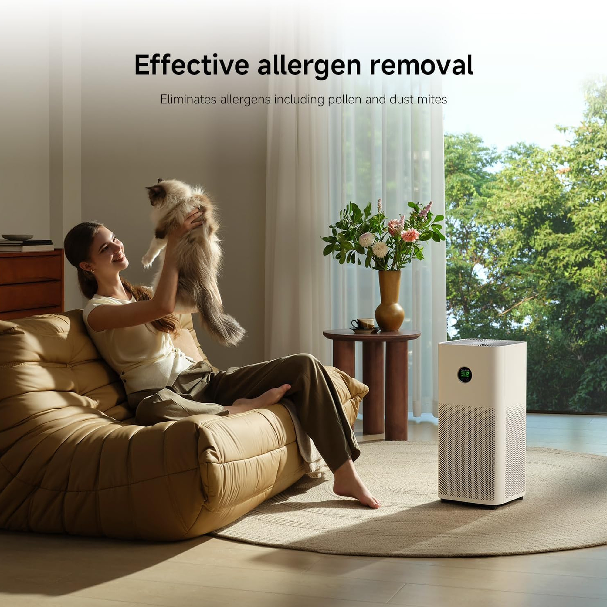 Xiaomi Smart Air Purifier 6 removing pet allergens in a living room with a cat
