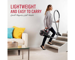 Hoover CDCY-P6ME lightweight vacuum in use