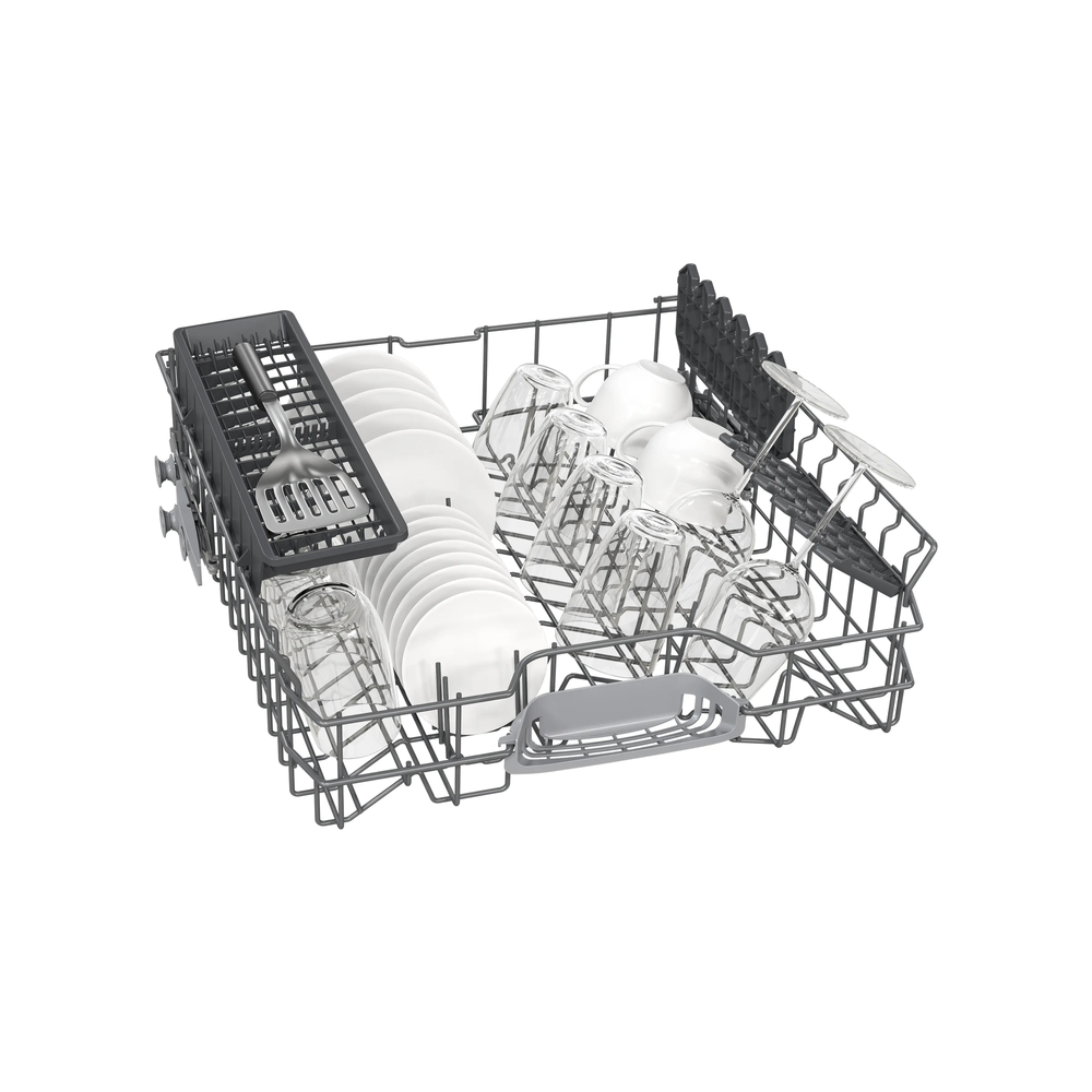 Fully loaded upper basket of the Siemens SN616X00AM dishwasher with plates, glasses, and cutlery tray