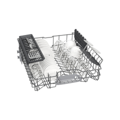 Fully loaded upper basket of the Siemens SN616X00AM dishwasher with plates, glasses, and cutlery tray